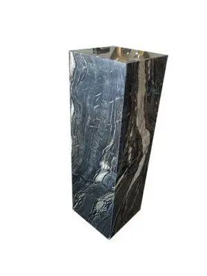 Tall marble pedestal with dark veins