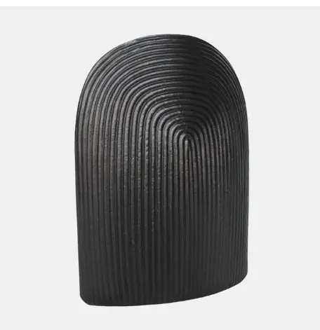 Modern ribbed black decorative object