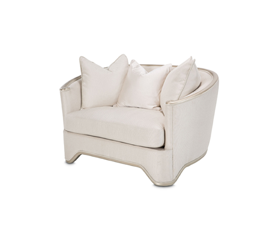 Modern cream armchair with cushions