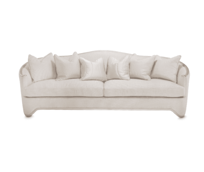 Plush white couch with pillows