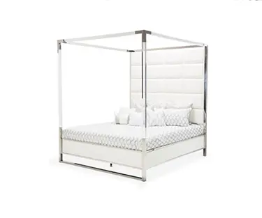 Elegant canopy bed with pillows