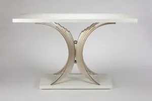 Modern sculptural table with metallic base