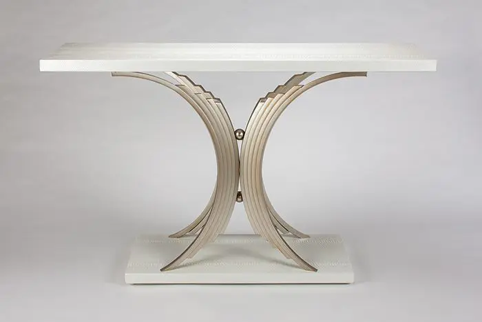 Modern sculptural table with metallic base