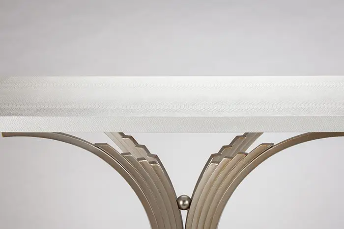 Stylish table featuring geometric metal legs