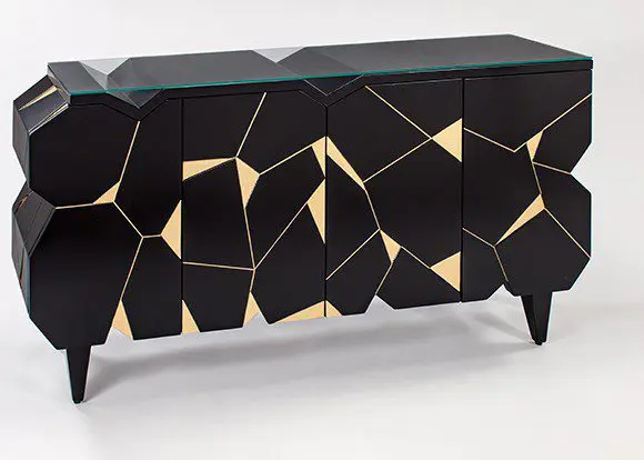 Artistic black furniture with gold accents