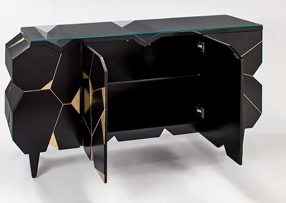 Black cabinet featuring geometric patterns