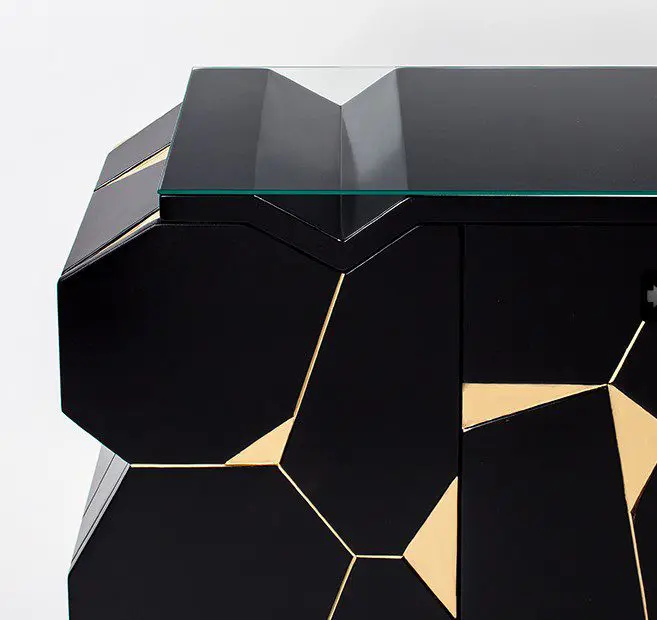 Stylish cabinet featuring geometric gold patterns