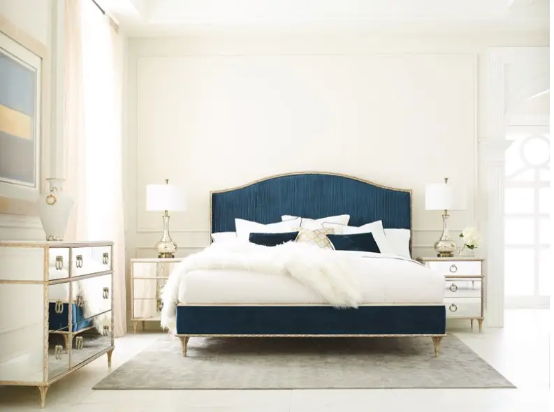 Luxurious bedroom with mirrored furniture