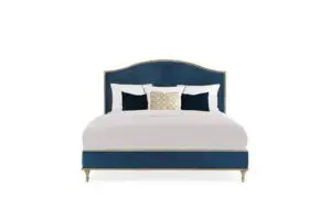 Luxurious bed with decorative pillows