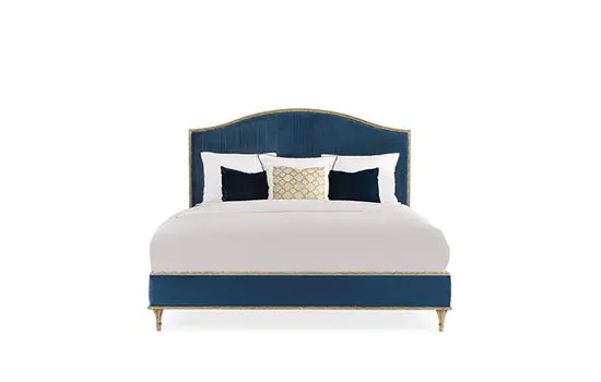 Luxurious bed with decorative pillows