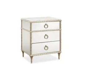 Mirrored three-drawer nightstand with gold accents.