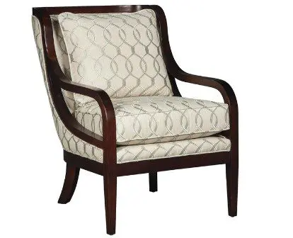 Wooden armchair with patterned cushions