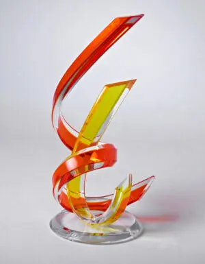 Dynamic glass artwork with sweeping lines.