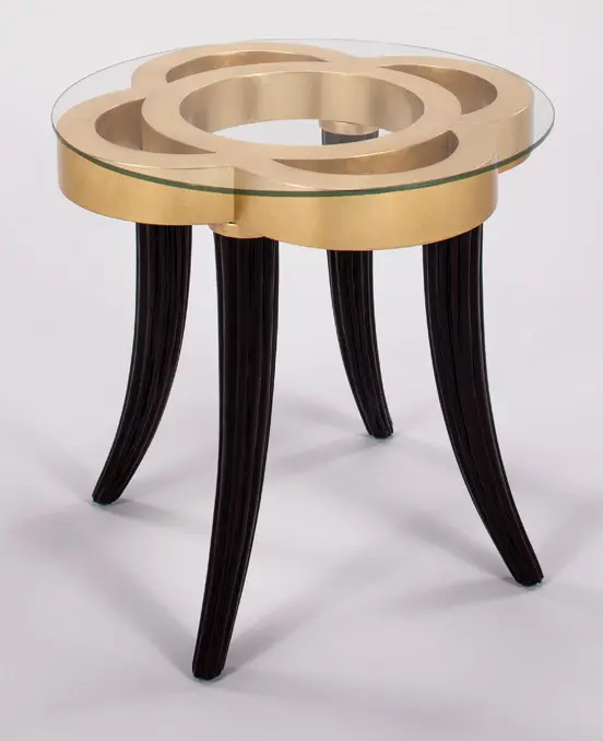 Elegant glass-top table with curved legs