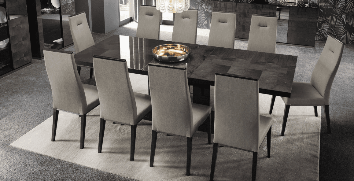 Stylish dining area featuring dark wood table