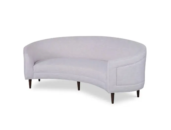 Curved gray sofa with wooden legs