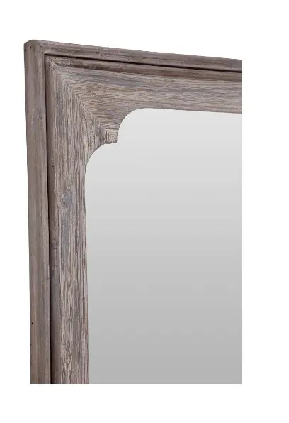 Detailed wooden frame of a wall mirror
