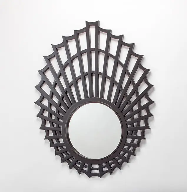 Ornate round mirror with geometric frame