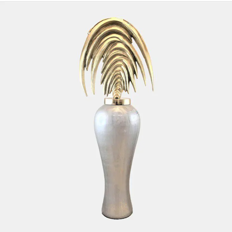 Artistic vase featuring golden feather design