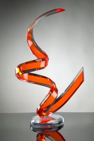 Red spiral glass sculpture on display