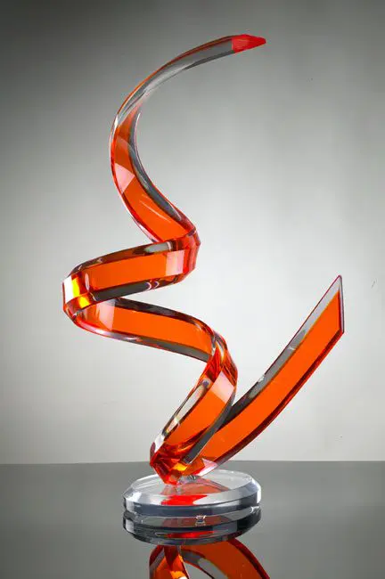 Red spiral glass sculpture on display