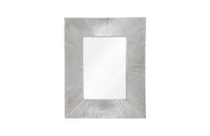 Elegant mirror featuring a metallic border