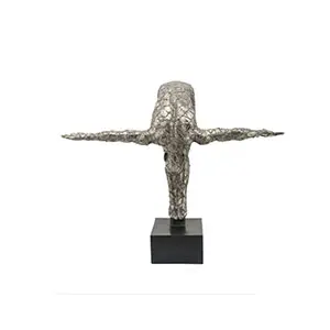 Metal sculpture with outstretched arms