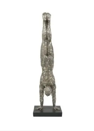 Wire sculpture of person doing handstand