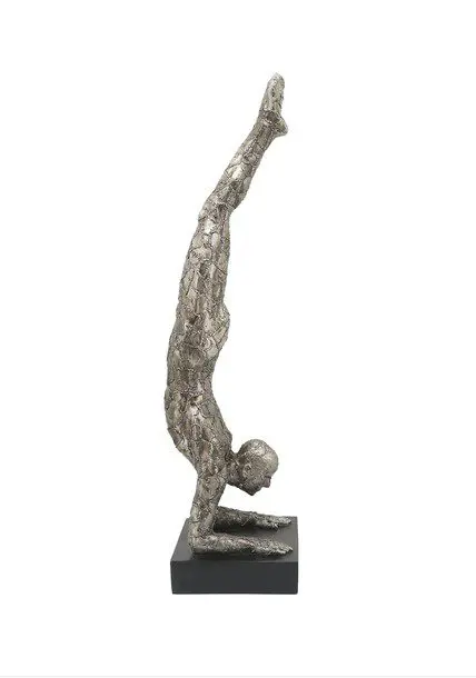 Artistic figure in handstand position