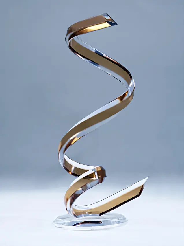 Abstract twisting art piece on pedestal