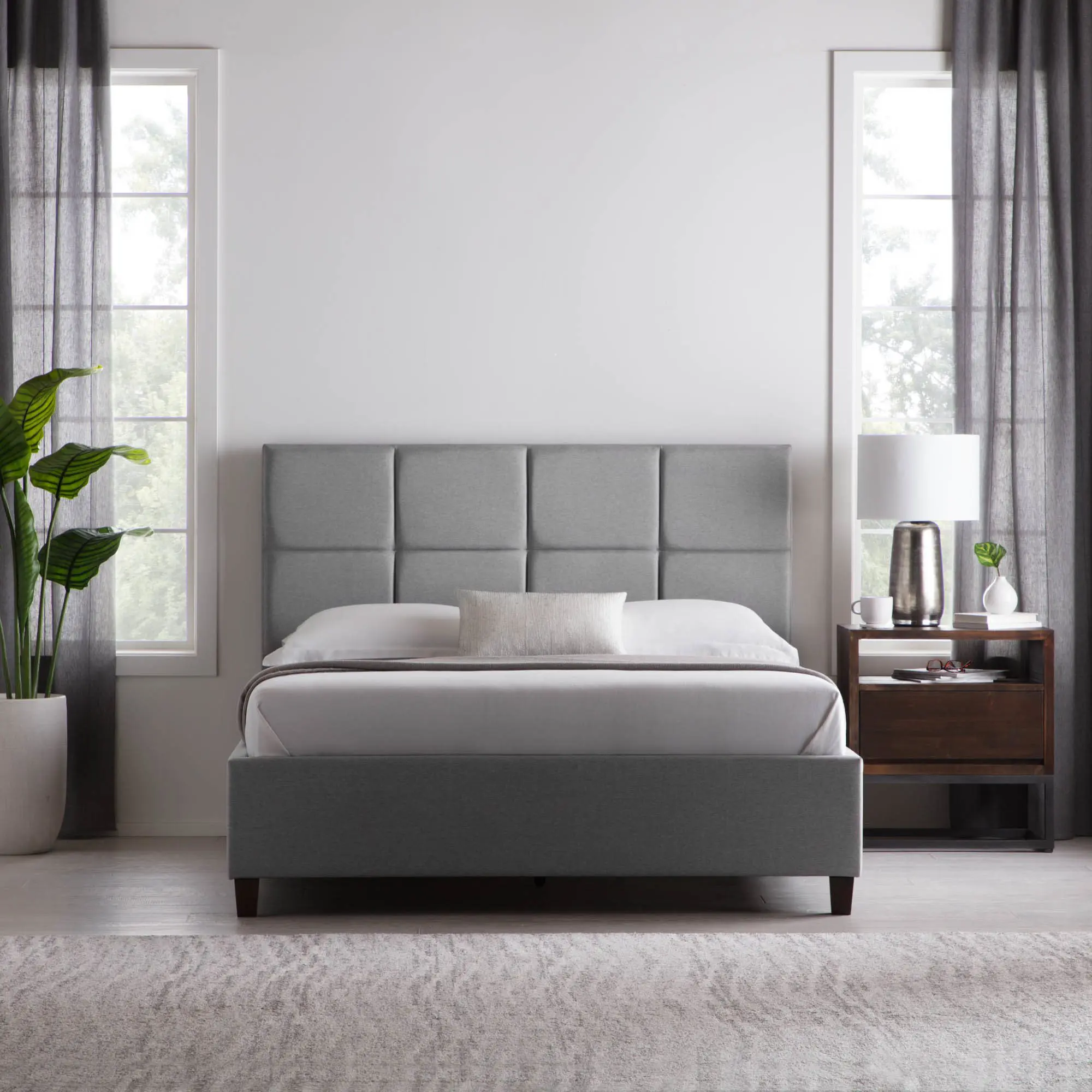 Modern bedroom with gray bed frame