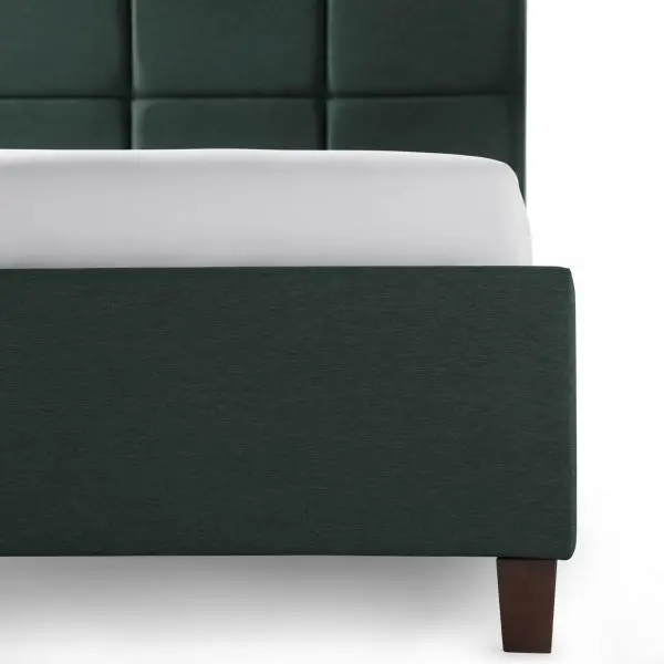 Modern bed with white bedding