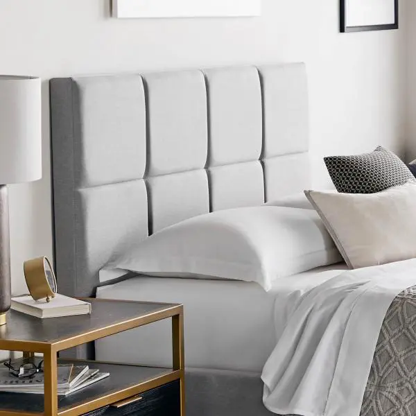 Elegant bedroom featuring stylish bedside table