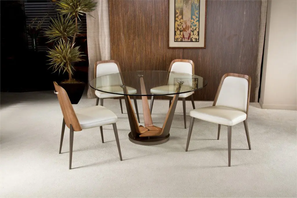 Mid-century chairs around glass dining table