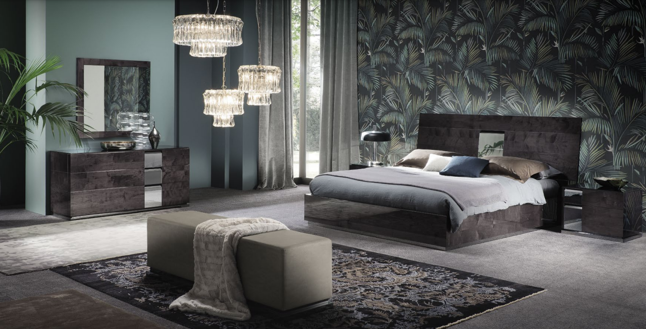 Luxurious bedroom with dark wood furniture.