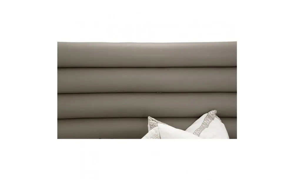 Modern headboard with white pillows