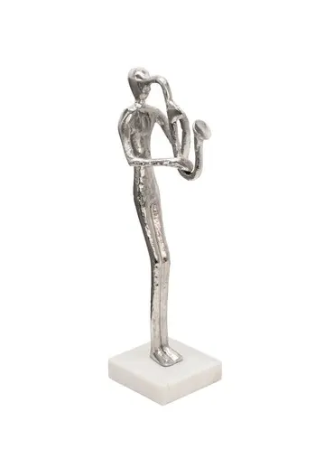 Abstract saxophone figure on display stand