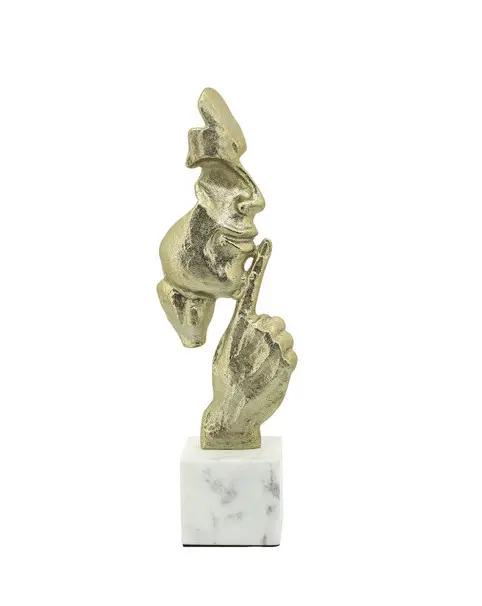Abstract golden sculpture on marble base